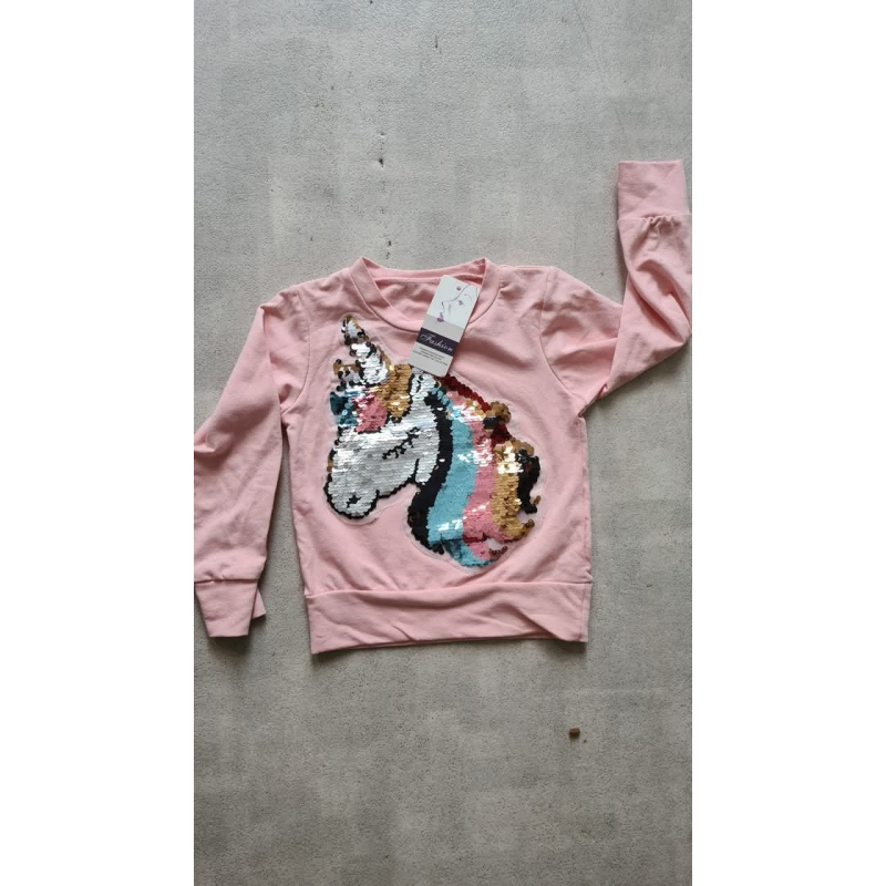 Zalm kleur trui met wrijf pailletten 